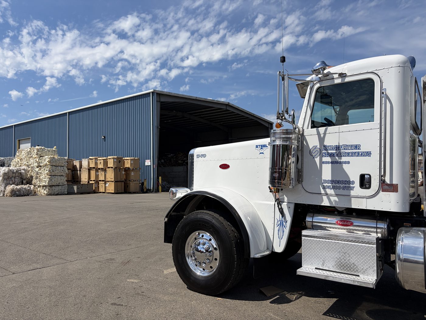 Truck at the Burlington loading dock with baled recyclable materials
